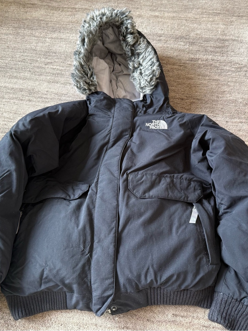 The North Face Girls Black Puffer Jacket with Faux Fur Trimmed Hood